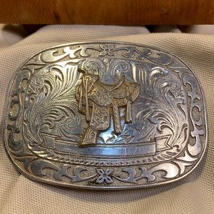 Silvertone carved belt buckle